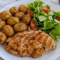 Grilled Chicken Breast with Potatoes and Salad